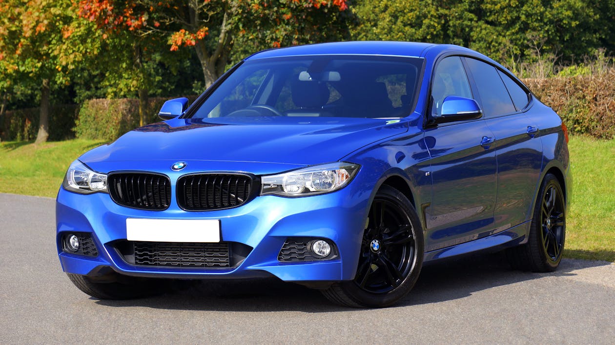 Car - Blue sports car on road